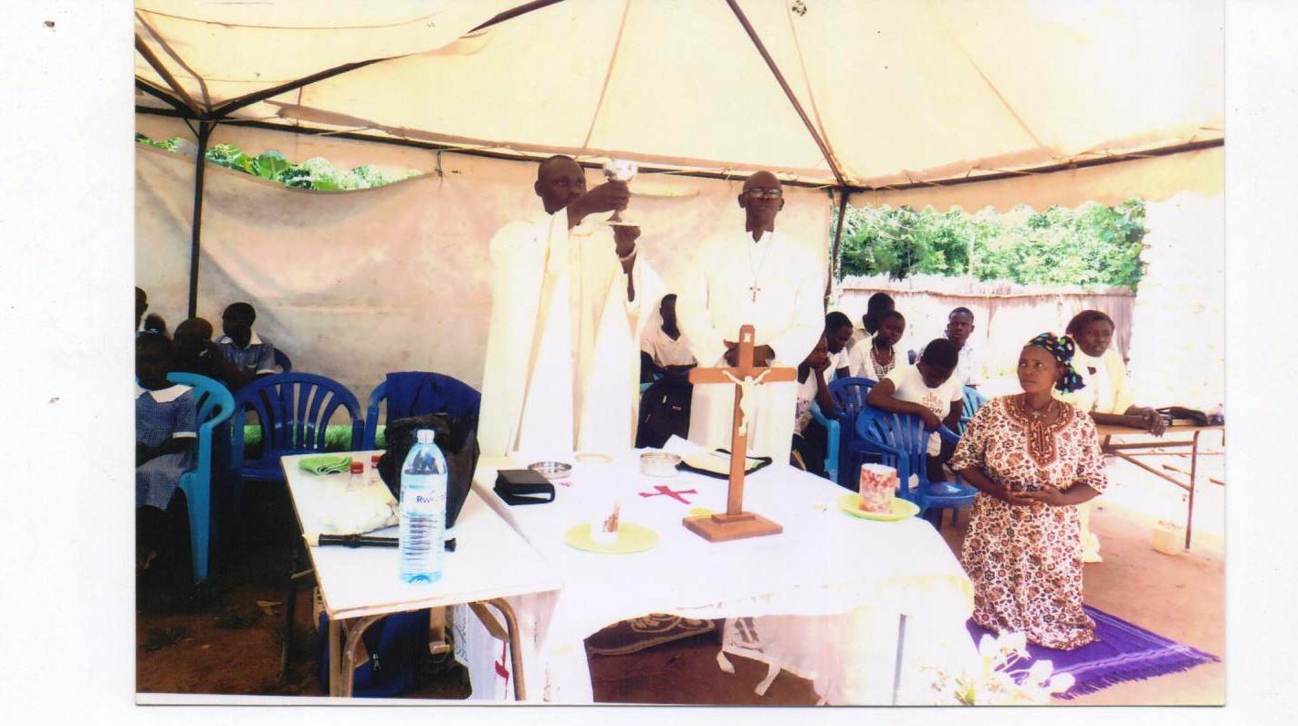 Father Michael Oluka, Mass, Uganda, chalice