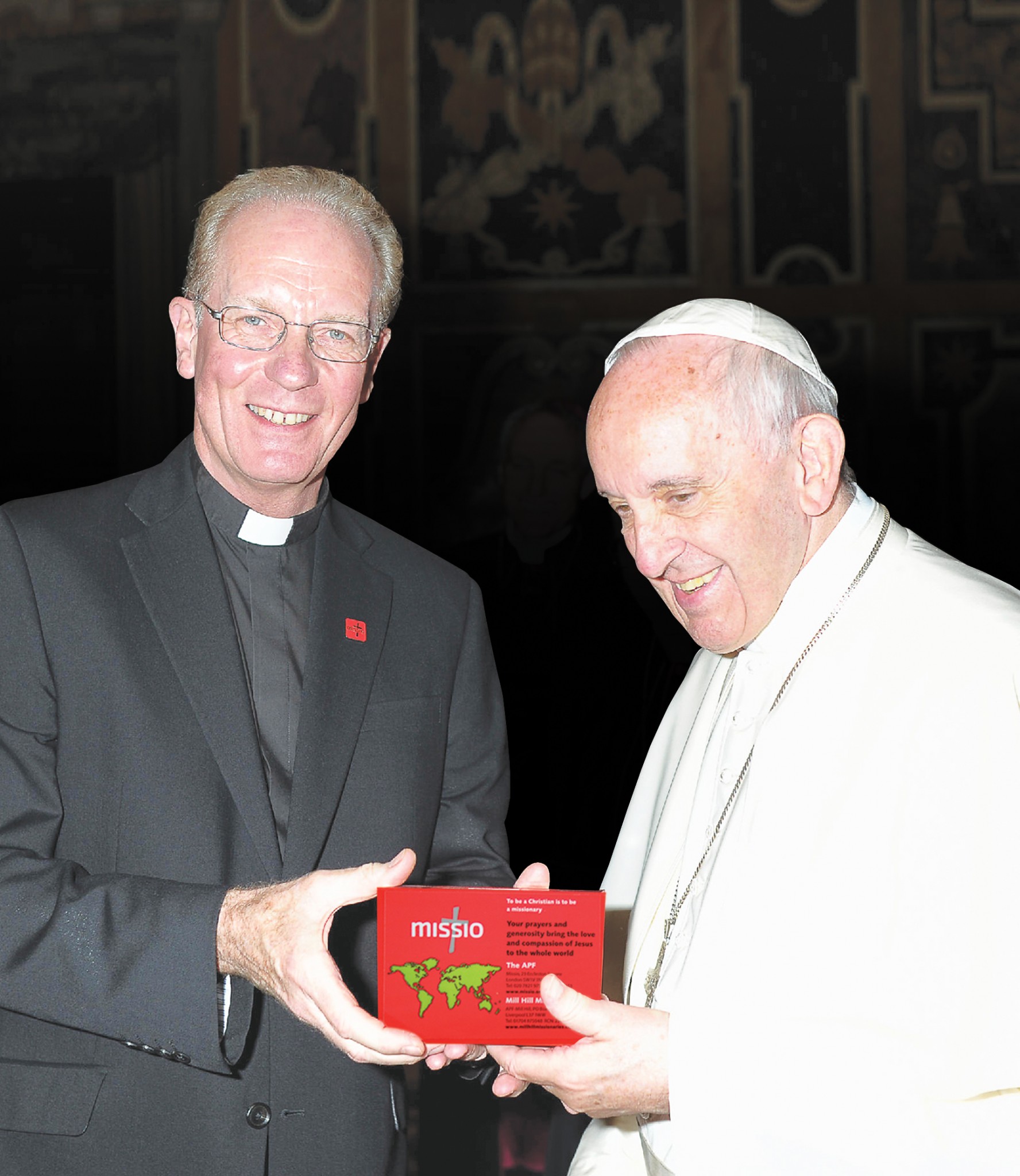 Father Anthony Chantry giving Pope Francis a Red Box