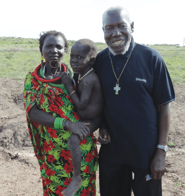 Mother, her child (John) and Bishop Paride Taban, Peace Village, Kuron, South Sudan