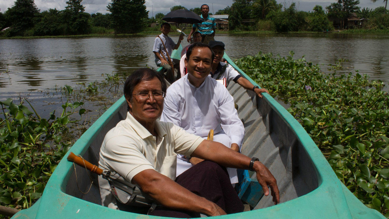 Fr John Paul travelling by boat to a remote village in his parish in Yangon Archdiocese, Myanmar