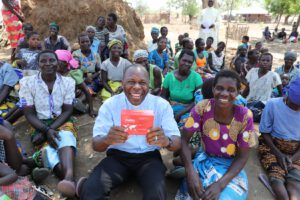 Fr Vincent in Malawi with the Red Box