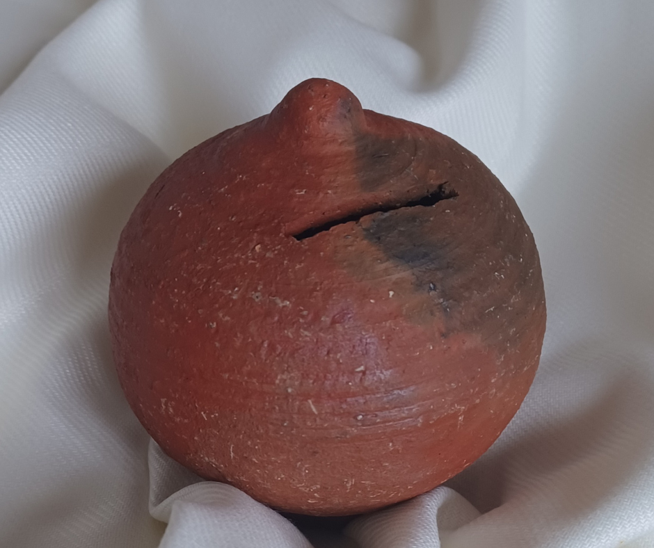 The clay pot used to collect donations