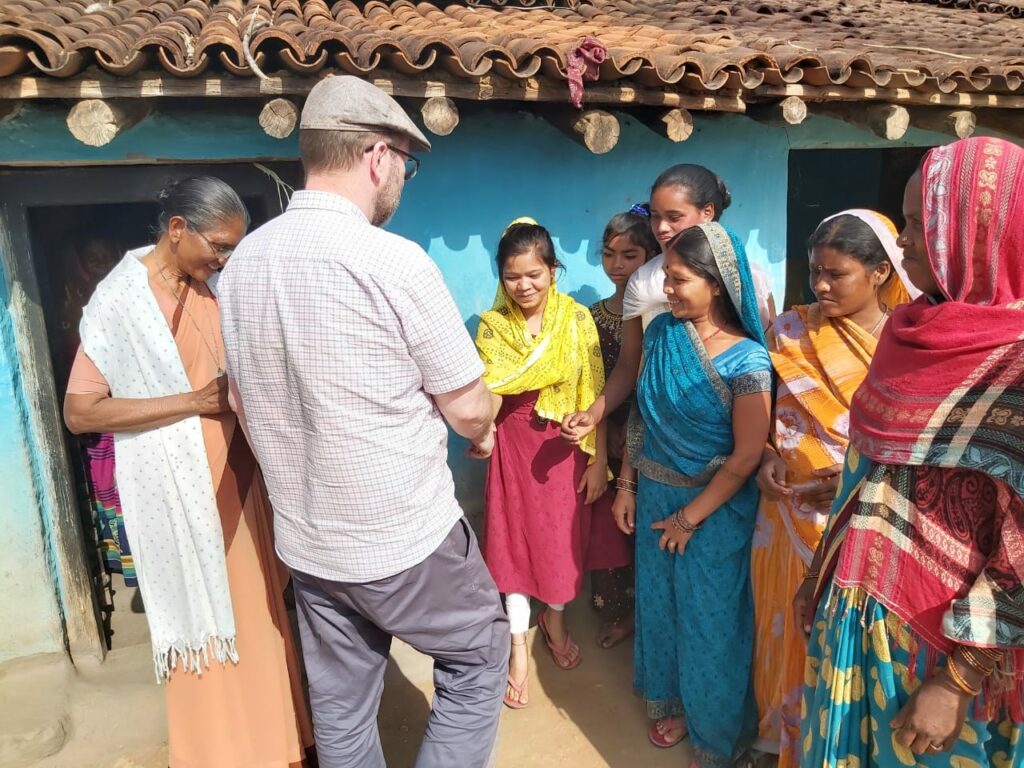 Fr Gerry with villagers in Vishunpur