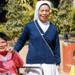 A missionary Sister with children who have special needs