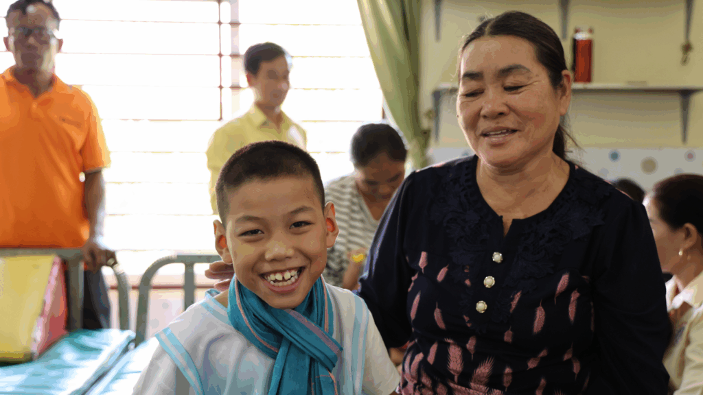 A child and his grandmother at the Phnom Penh Peace Centre, Cambodia