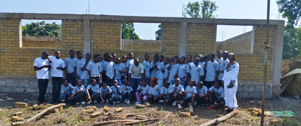 Mill Hill Missionary, Fr Patrick, with children in the Democratic Republic of the Congo (DRC)