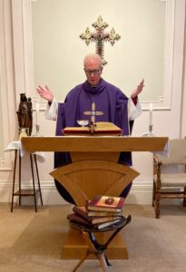 Fr Anthony Chantry remembering the intentions of supporters at Mass
