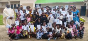 Mill Hill Missionary, Fr Patrick, with children in DRC
