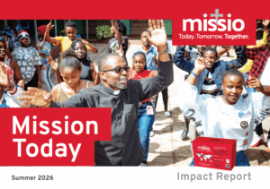 After Mass, Fr Patrick celebrates with young people attending an interfaith youth activity at a shelter for orphaned and former street children in Nairobi, Kenya